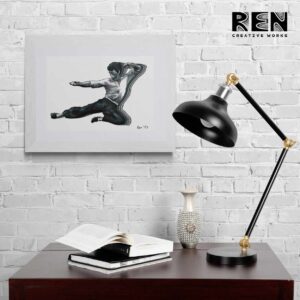 A dynamic portrait of martial arts legend Bruce Lee, painted by Adrian Reynolds, hangs above a side table.