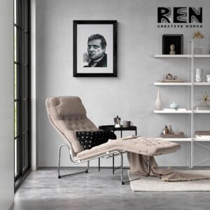 A captivating portrait by Adrian Reynolds depicts the legendary Oliver Reed. His features are rendered with such detail that you can practically hear his booming voice echo through the room.