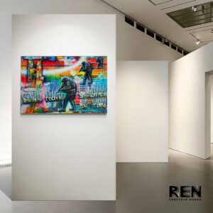 Thought-provoking abstract piece "Bullets Travel Distance & Time" by Adrian Reynolds displayed on a gallery wall.